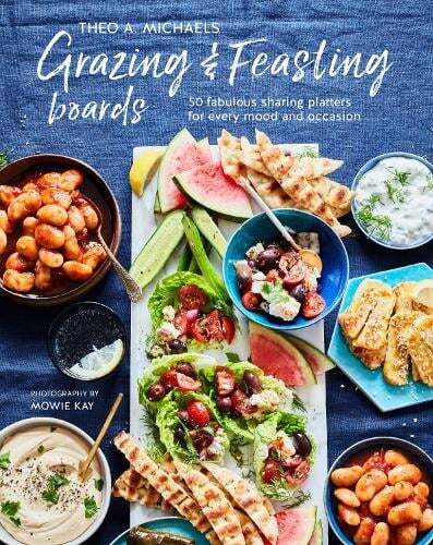 This is the book cover for 'Grazing & Feasting Boards' by Theo A. Michaels